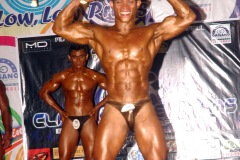 Open-Category-Champ-Martin-Catiganfront-double-biceps-pose-web