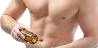 FDA Warns Against the Use of Selective Androgen Receptor Modulators (SARMs) Among Teens and Young Adults Person holding a bottle of diet pills