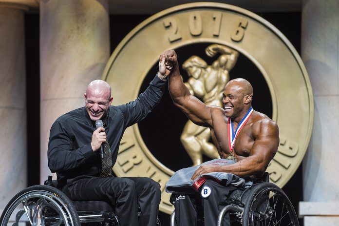 Arnold Classic Pro Wheelchair winner Harold Kelley right with event Director Nick Scott left