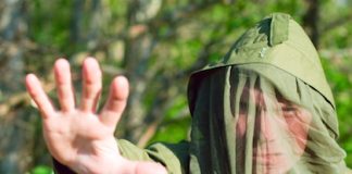 Solution to the Buzzing, Bites, and Bumps bigstock Man In Encephalitis Protective 5461999