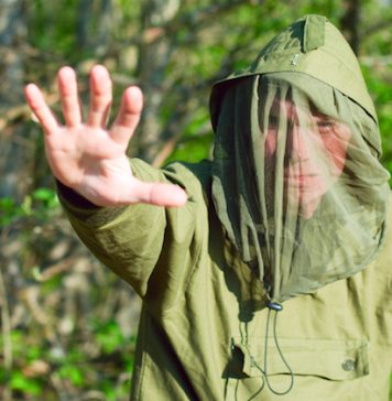 bigstock Man In Encephalitis Protective 5461999