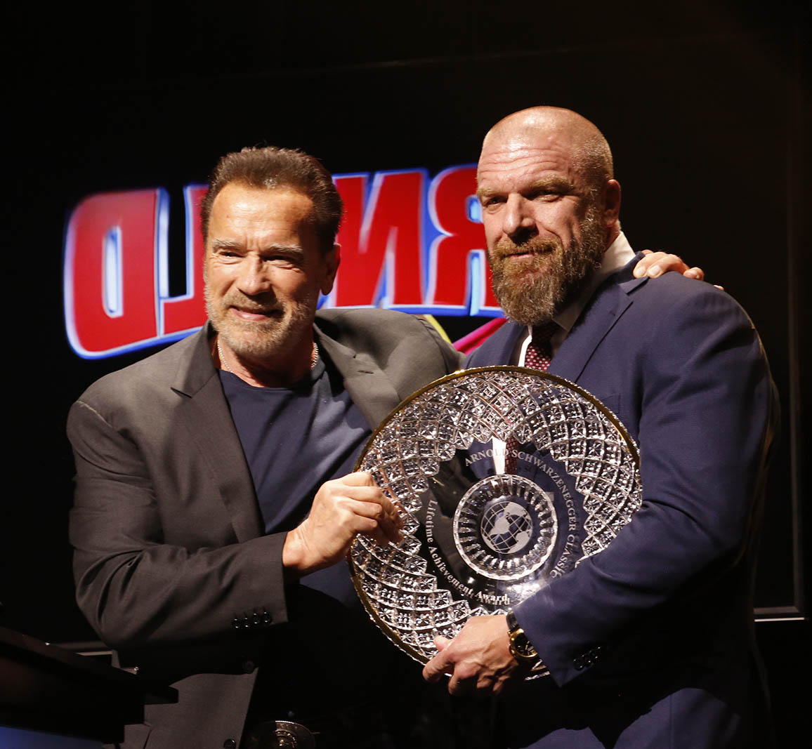 Lifetime Achievement Award winner Paul Levesque with Gov. Arnold Schwarzenegger