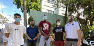 Newest Fighting Maroons help man community pantry in UP Diliman Left to Right CJ Casino, Renan Dalisay, Malick Diouf, Coach Mo Gingerich, Coach Poch Juinio