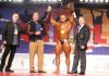 Mens Bodybuilding Overall Winner left to right Jim Manion Arnold Schwarzenegger Sergey Kulaev of Russia Dr Rafael Santonja