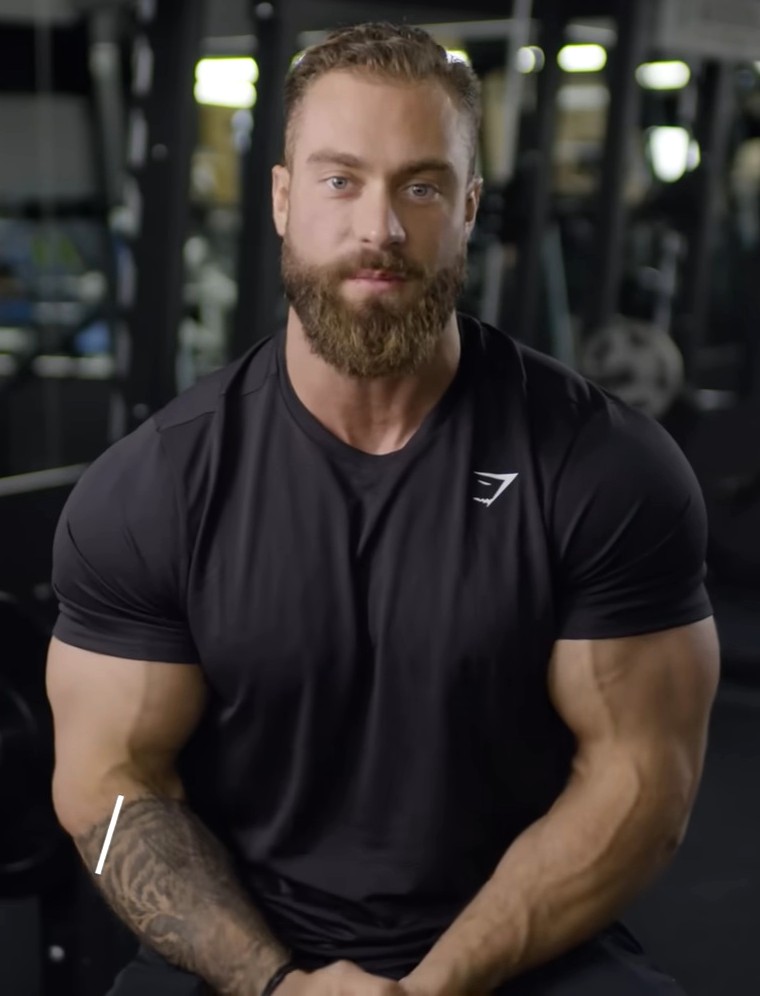 Chris Bumstead Passes the Torch: The Rise of 21-Year-Old Bodybuilding Phenom 1 By Gymshark - Chris Bumstead Reacts to Thirst Tweets and TikToks | Gymshark at 0:10, cropped, brightened, CC BY 3.0